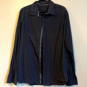 Black long sleeve button down shirt.